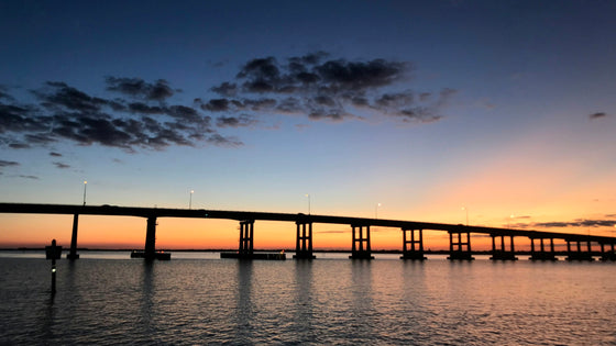 Bridge over the Caloosahatchee River at sunset, seen from the Hendry Street lookout pier in downtown Fort Myers